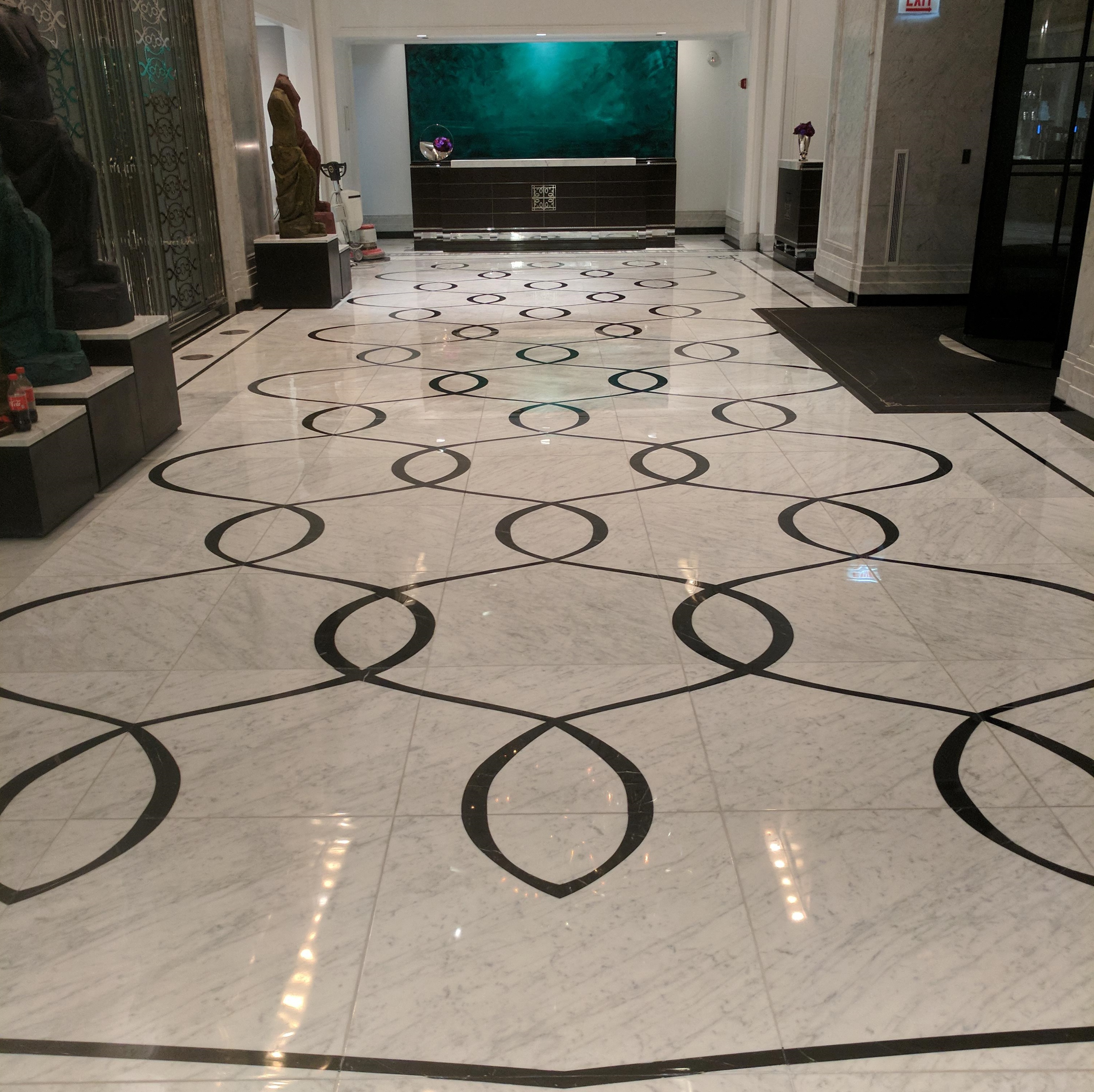 Waldorf Astoria Chicago lobby floor stone reflective post-restoration